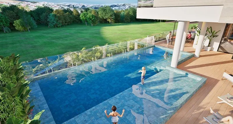 Área de lazer com piscina do Kairós Residence